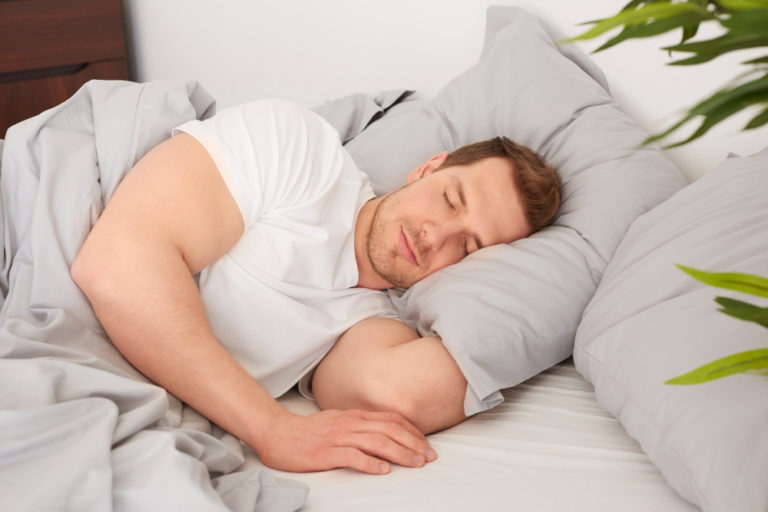 man-sleeping-comfortable-bed-healthy-sleep-fitness-fitnesshub-fitnesshub24x7